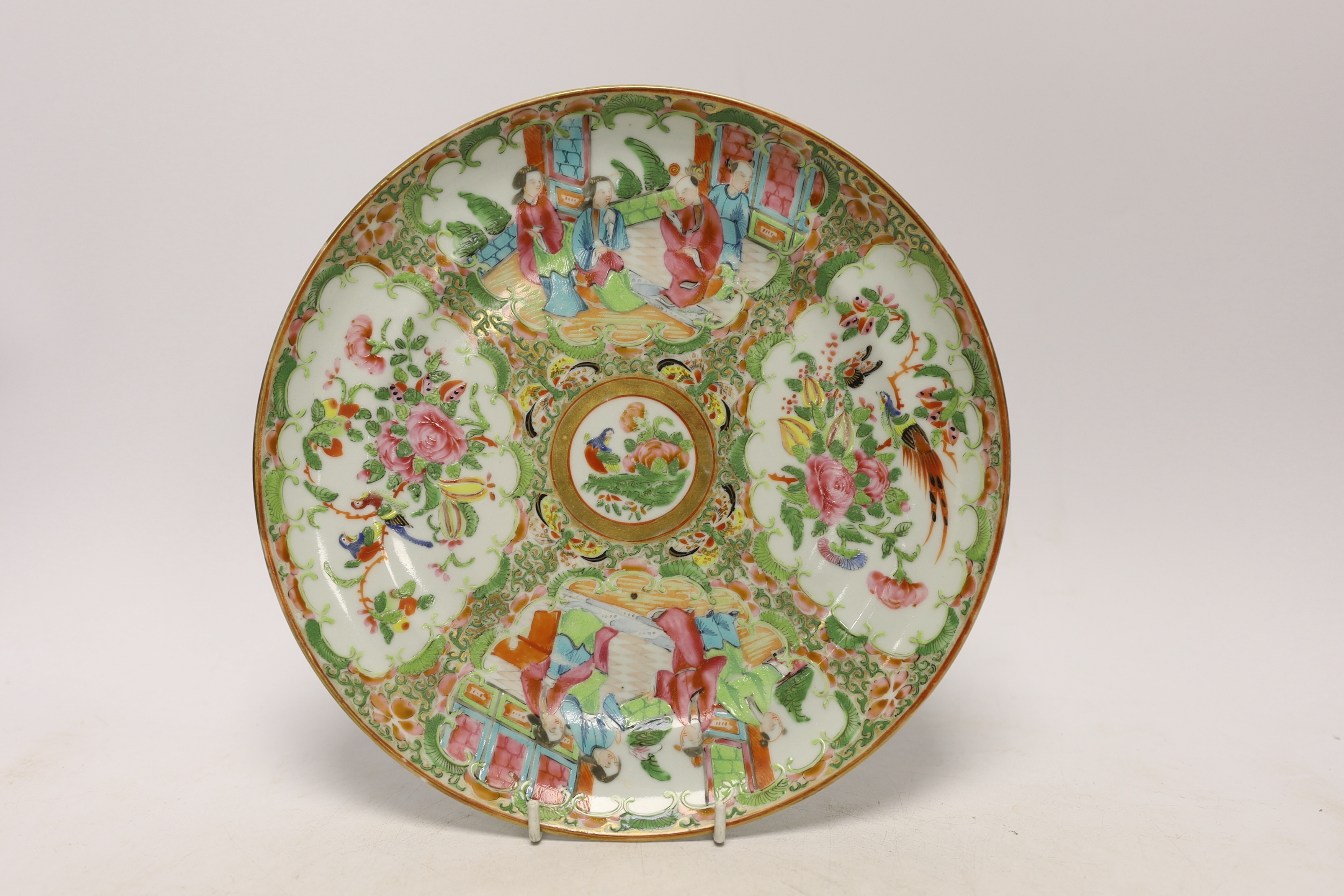 A late 18th century Chinese famille rose plate and a 19th century famille rose plate, largest 24.5cm in diameter
